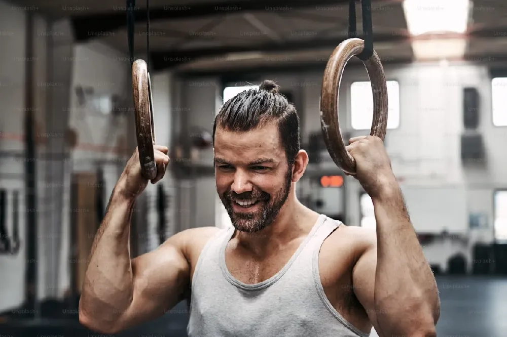 photo of CrossFitter finishing Cindy, sweaty but smiling
